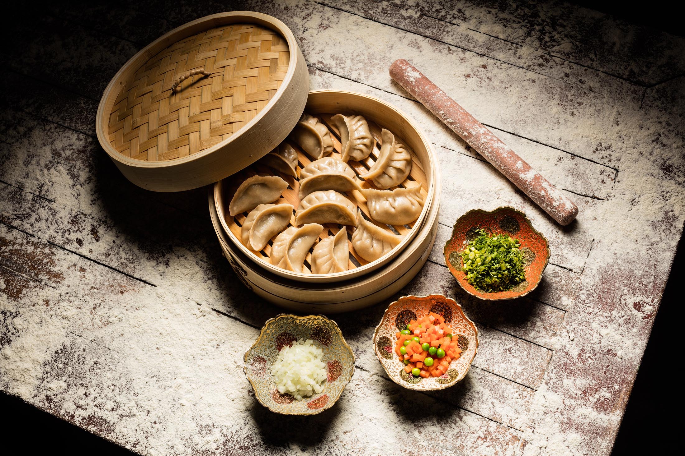 An old table served well as a rustic environment for this dumpling shot. © David Hartung
