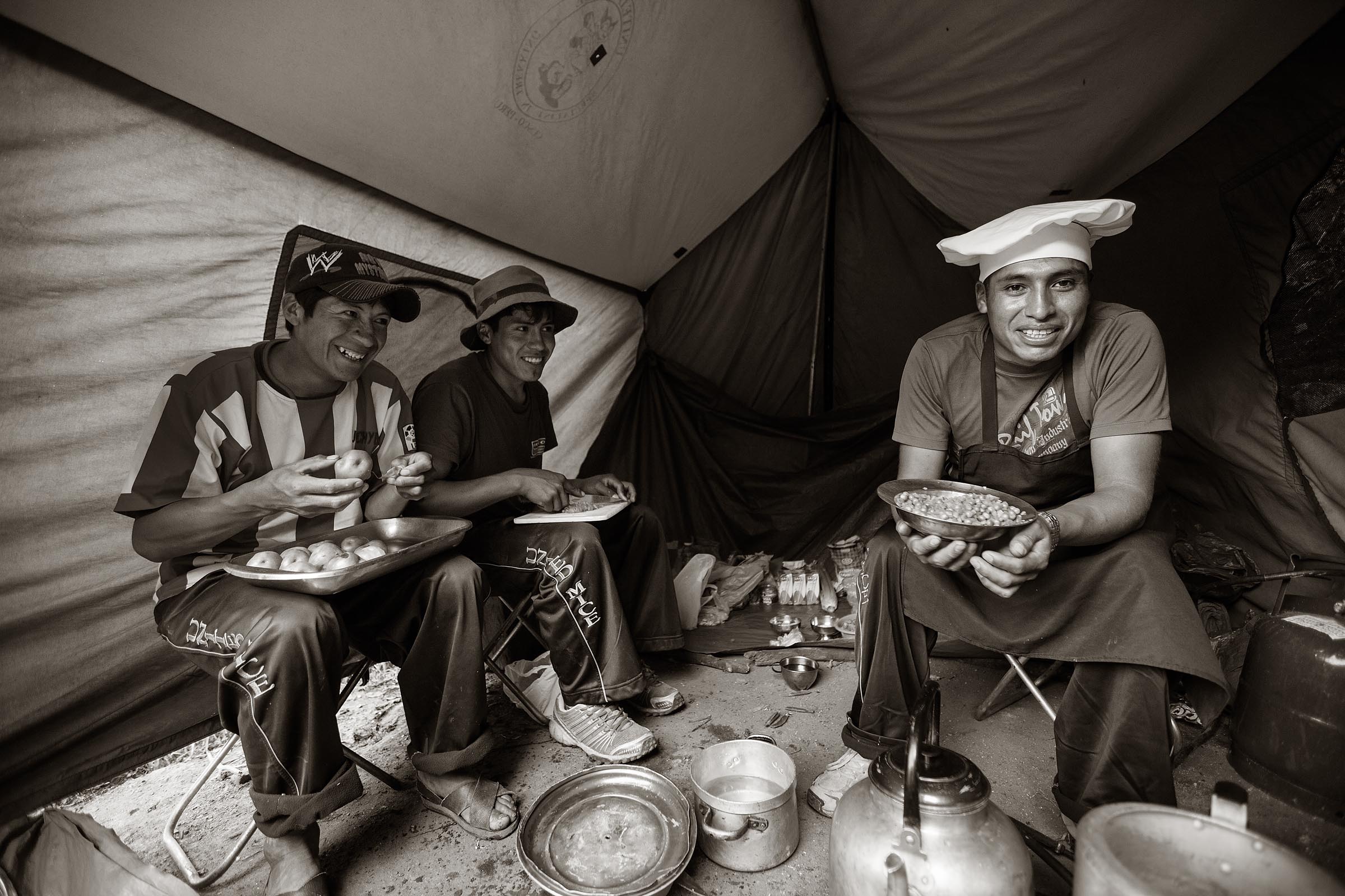 Portrait of a camp chef as he prepares the evening meal.